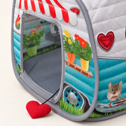 Close view of KONG camper doorway and attached red heart toy